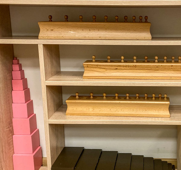 Montessori works on shelves